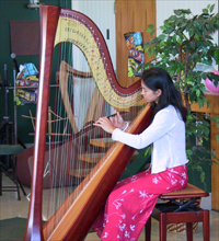 San Jose harp student Audrey performs in recital